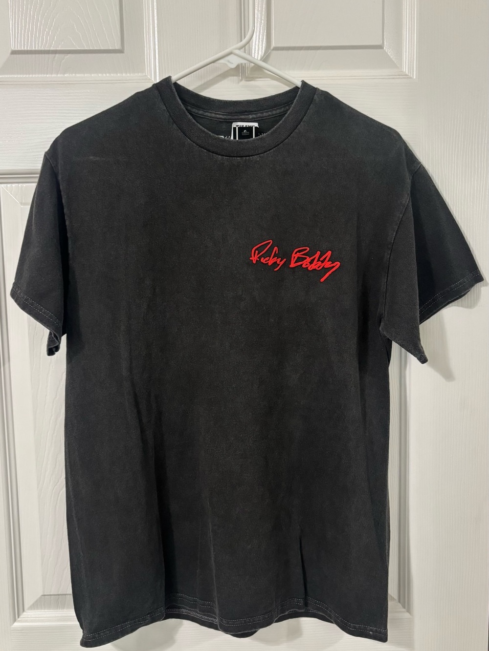 Tilly’s Ricky Bobby Graphic Logo Tee with Red Script